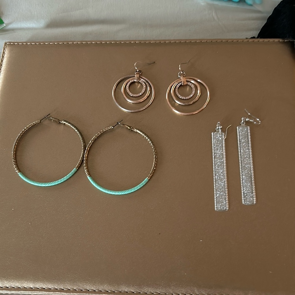 3 sets of earrings , turquoise and gold hoops, silver glitter , and gold